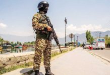 An Indian paramilitary soldier stands alert on the bank of Dal lake, amid heightened tensions following a deadly attack in Pahalgam that killed 26 tourists, on April 26, 2025, in Srinagar, India. GETTY IMAGES