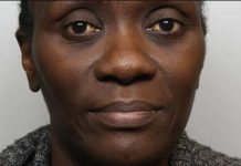 This is a police mugshot of Lydia Mugambe, a United Nations judge found to have abused her position of power to use the young woman as a slave. THAMES VALLEY POLICE
