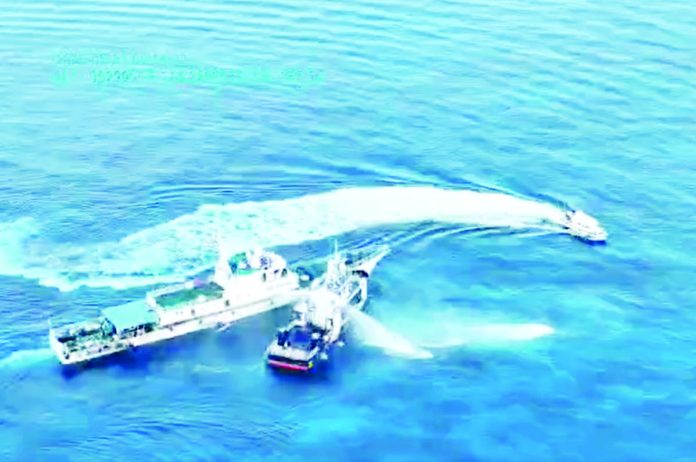 WPS_resized This video grab from the National Task Force-West Philippine Sea shows a Chinese Coast Guard (CCG) vessel blasting water cannons and sideswiping a Philippine ship conducting a routine marine scientific research mission in the vicinity of Pagasa Cay 2 (Sandy Cay) in the West Philippine Sea on May 22, 2025.