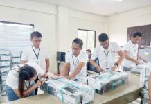 The Commission on Elections and the City Treasurer’s Office thoroughly inspected the 417 boxes of official ballots intended for all clustered voting precincts in Iloilo City to ensure the accuracy and integrity of the delivered ballots. LYNDIE C. DEFACTO PHOTO
