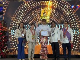 Iloilo City Public Employment Service Office manager Gabriel Felix Umadhay (center) receives the Best PESO in Western Visayas award from the Department of Labor and Employment at a ceremony in Iloilo City on May 15, 2025. Umadhay said they look forward to expanding the implementation of livelihood programs and making it more accessible under the incoming administration. PHOTO COURTESY OF PESO ILOILO CITY