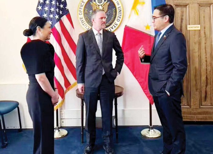 Trade Secretary Ma. Cristina Roque (left) and US Trade Rep. Jamieson Greer (middle) listen as Frederick Go explains a point, following a meeting between Greer and the Philippine delegation led by Go, special assistant to the President for investment and economic affairs. PHILIPPINE DAILY INQUIRER/CONTRIBUTED PHOTO