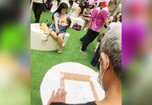 Members of the Himbon Contemporary Ilonggo Artists Group do a live sketch of lactating mothers and their children as part of the activities during the Breastfeeding Art Exhibit at a mall, in this 2022 file photo. The City Health Office continues to advocate for exclusive breastfeeding and complementary feeding to prevent malnutrition. FILE PHOTO COURTESY OF HIMBON
