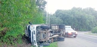 A delivery truck fell on its side while traversing a steep curve in Barangay San Juan, Barotac Viejo, Iloilo. One helper died and three others were injured. BAROTAC VIEJO MPS PHOTO