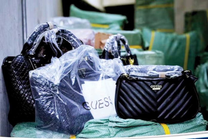 fake_luxury_goods_1_resized The Bureau of Customs seizes fake luxury goods in Divisoria during a series of warehouse inspections conducted on May 23, 2025. BUREAU OF CUSTOMS PHOTO