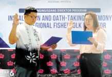 Jehro S. Labrador (left) takes his oath as the new regional fisherfolk director of Western Visayas on May 5, 2025 before Bureau of Fisheries and Aquatic Resources Regional Director Remia Aparri (right).