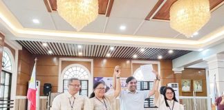 Officers of the Commission on Elections-Capiz officially proclaim Howard Guintu (second from right) as the elected representative of the province’s 1st District on May 13, 2025. PHOTO COURTESY OF BOMBO RADYO ROXAS