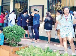 On election day, May 12, 2025 at Leganes Elementary School in Leganes, Iloilo, voters wait for their turn to enter their polling precinct. According to the Commission on Elections, 2,704,681 out of 3,128,102 registered voters in Western Visayas participated in the polls. PN