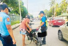 Personnel of the Iloilo City Traffic and Transportation Management Office (ICTTMO) flag down a motorcyclist along Huervana St., La Paz district for a traffic violation on May 28, 2025. The ICTTMO has issued citation tickets to a total of 2,363 motorcycle riders from January to May 5, 2025. ILOILO CITY TRAFFIC AND TRANSPORTATION MANAGEMENT OFFICE PHOTO