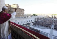 Pope Leo XIV blesses the thousands of people gathered at St. Peter’s Square at the Vatican after he was elected the 267th successor of Saint Peter and leader of the 1.4-billion Catholics.