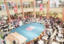 Thousands of hopefuls line up and sit across recruiters during the Labor Day Job Fair 2025 at Robinsons Place Iloilo – Main in Iloilo City on May 1, where 527 jobseekers were hired on the spot. Organized by the Department of Labor and Employment, the event featured over 9,000 job vacancies from local and overseas employers, along with support booths offering government services, free medical check-ups, and livelihood assistance.