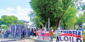 Members of various transport groups under the Panay-Negros United Transport Coalition stage a protest at Jaro Plaza in Iloilo City on May 30 to oppose the phase-out of traditional jeepneys and call for the reinstatement of unconsolidated units. They later marched to the Land Transportation Franchising and Regulatory Board regional office demanding equal rights and registration for all public utility jeepney operators. AJ PALCULLO/PN