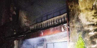 Firefighters help extinguish the fire that hit a house on Thursday night, May 8, 2025, in Barangay Baybay, Roxas City. BASKOG RADYO/FACEBOOK PHOTO
