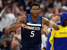 Anthony Edwards celebrates a three-pointer in Minnesota Timberwolves' series-leveling win of Golden State Warriors. GETTY IMAGES