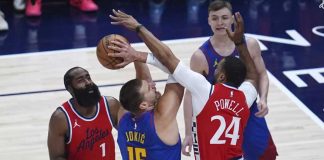 Denver Nuggets’ Nikola Jokic attempts to score against the defense of Los Angeles Clippers' Norman Powell. AP