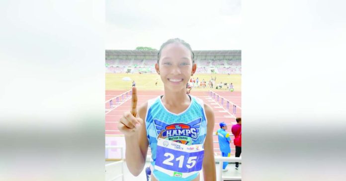 sports Palaro_superimposed Eda Mae Arceo of Carles Central Elementary School takes the gold in the Palarong Pambansa 2025 elementary girls 400-meter hurdles to add to her earlier gold medal in the 100-meter hurdles. PHOTO COURTESY OF RAY CABARLES
