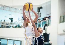 Ilongga Lea Pinuela of University of Santo Tomas Growling Tigresses grabs the rebound. UAAP PHOTO