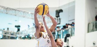 Ilongga Lea Pinuela of University of Santo Tomas Growling Tigresses grabs the rebound. UAAP PHOTO