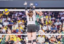 Ilongga Amie Provido of De La Salle University Lady Spikers scores against the defense of University of Santo Tomas Golden Tigresses’ Pia Abbu. UAAP PHOTO