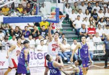 Barangay Ginebra San Miguel Kings’ Benedict Adamos scores against the defense of Converge FiberXers' Kevin Racal. PBA PHOTO