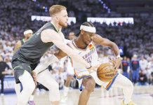 Oklahoma City Thunder’s Shai Gilgeous-Alexander tries to move away from the defense of Minnesota Timberwolves’ Donte DiVincenzo. AP
