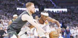 Oklahoma City Thunder’s Shai Gilgeous-Alexander tries to move away from the defense of Minnesota Timberwolves’ Donte DiVincenzo. AP