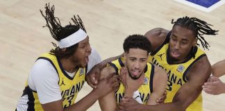 Tyrese Haliburton makes a choke gesture after leading Indiana Pacers to a comeback win over the New York Knicks. AP
