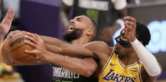 Minnesota Timberwolves Rudy Gobert battles Los Angeles Lakers' Rui Hachimura for the rebound. AP