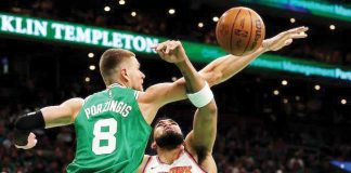 Boston Celtics’ Kristaps Porzingis foils the shot attempt of New York Knicks’ Karl-Anthony Towns. NBA PHOTO