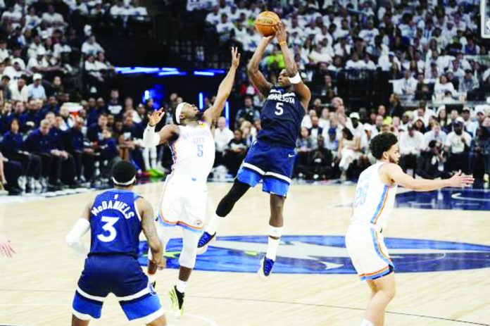 sports_NBA_resized Minnesota Timberwolves’ Anthony Edwards pulls up for a shot against Oklahoma City Thunder’s Luguentz Dort. AP
