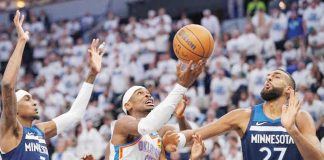 Oklahoma City Thunder’s Shai Gilgeous-Alexander goes for a layup against the defense of Minnesota Timberwolves’ Rudy Gobert. PHOTO COURTESY OF USA TODAY
