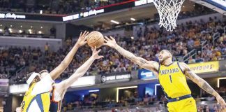 Indiana Pacers’ Myles Turner and Obi Toppin tries to reach the ball for the rebound. PHOTO COURTESY OF INDY STAR