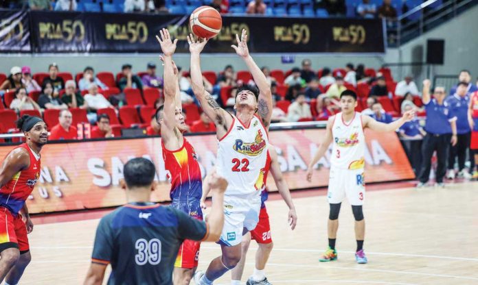 sports_PBA_resized Rain or Shine Elasto Painters’ Jhonard Clarito draws a foul from Phoenix Fuel Masters’ Sean Manganti. PBA PHOTO