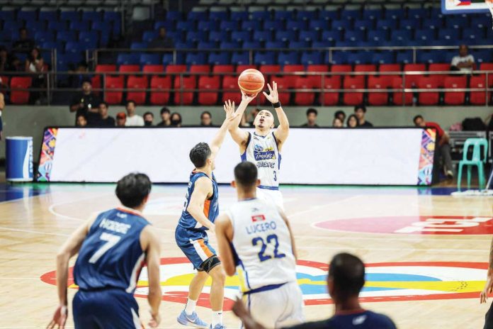 sports_Paul_Lee_resized Magnolia Chicken Timplados Hotshots’ Paul Lee shoots against the defense of Meralco Bolts’ Chris Banchero. PBA PHOTO