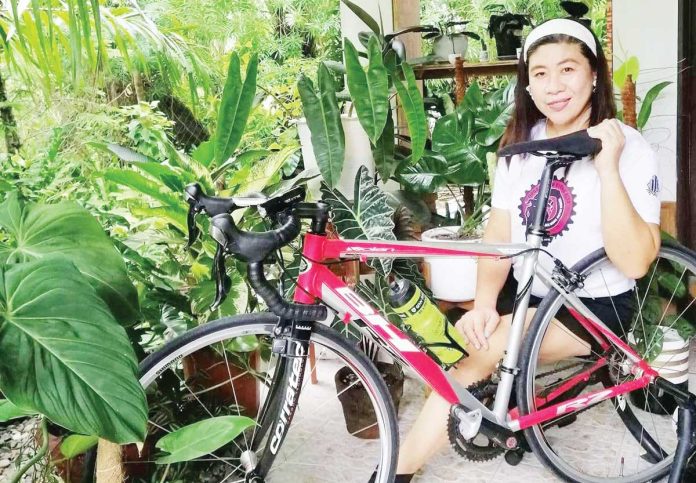 Rhea Jagunap is the president of the Leganes Bikers Club, the Iloilo Women Cycling Club, and United Bikers in Iloilo.