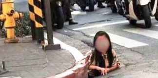 A woman is seen crawling out of a Makati City sewer at the corner of Rufino and Adelantado Streets in Salcedo Village, Barangay Bel-Air on May 26, 2025. PHOTO FROM ROUGHMASTERPIECEI/REDDIT