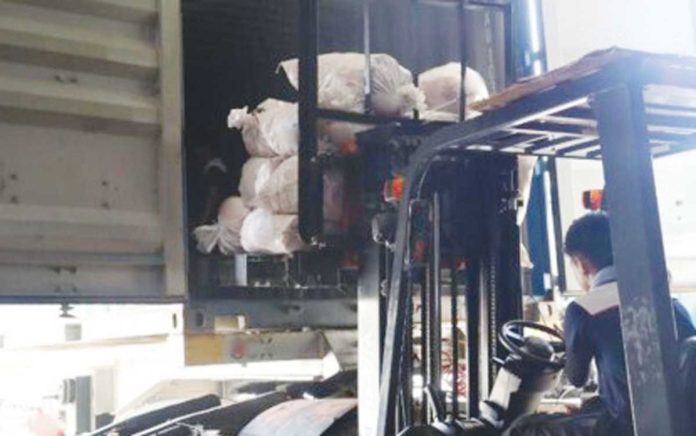 DTI-re-exports Packed rubber inner tubes are being loaded into a container truck. The Department of Trade and Industry said Friday, June 13, 2025, that about 9,499 pieces of non-compliant rubber inner tubes for motorcycles were sent back to their country of origin. DTI PHOTO