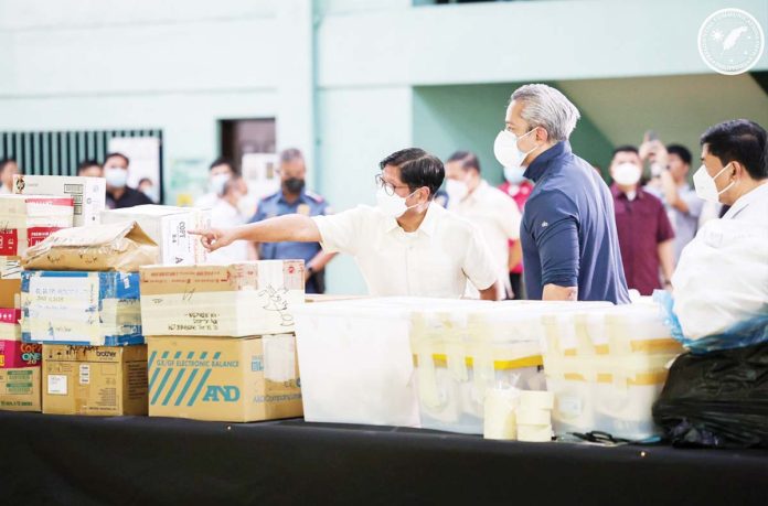 Marcos-touts At the Philippine Drug Enforcement Agency headquarters, President Ferdinand “Bongbong” Marcos Jr. inspects seized illegal drugs that are set to be burned. The total amount of shabu recovered by the administration has reached P62 billion. PCO