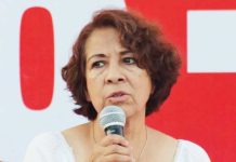 Lilia Gema García Soto speaks at a political event. She was killed during a meeting with another local official. FACEBOOK