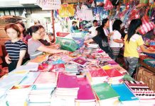 With school opening just around the corner, Divisoria is again the favorite hunting ground of customers looking for quality but cheap school supplies in Metro Manila. Picture shows women customers looking at the wide choices they have in Divisoria. PNA