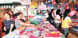 With school opening just around the corner, Divisoria is again the favorite hunting ground of customers looking for quality but cheap school supplies in Metro Manila. Picture shows women customers looking at the wide choices they have in Divisoria. PNA
