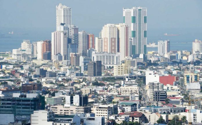 PH_GDP_resized Benign inflation perked up consumption in the second quarter, allowing economic output to grow by 5.6 percent. PHOTO BY TED ALJIBE / AFP