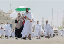 Muslims make their way to Mina during the Hajj pilgrimage, in Mecca, Saudi Arabia. Saudi authorities have urged pilgrims to follow strict guidelines to mitigate the effects of the intense heat, including using umbrellas. SAUDI PRESS AGENCY
