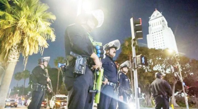 US_resized National Guard troops and Marines guard Los Angeles, California to quell protests triggered by immigration raids.
