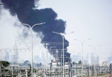 Thick black smoke billows over Herzliya, a coastal city north of Tel Aviv, following Iranian missile strikes on Israel. Known for its tech start-ups and affluence, Herzliya is among the areas rattled by the escalating conflict. REUTERS