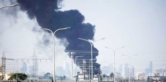 Thick black smoke billows over Herzliya, a coastal city north of Tel Aviv, following Iranian missile strikes on Israel. Known for its tech start-ups and affluence, Herzliya is among the areas rattled by the escalating conflict. REUTERS