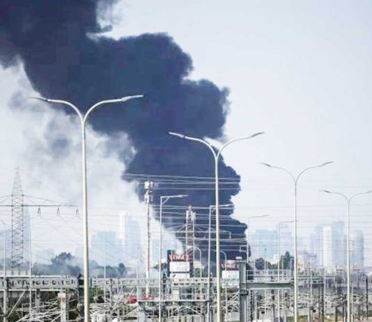 Thick black smoke billows over Herzliya, a coastal city north of Tel Aviv, following Iranian missile strikes on Israel. Known for its tech start-ups and affluence, Herzliya is among the areas rattled by the escalating conflict. REUTERS