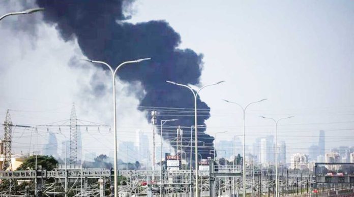 bomb-pic Thick black smoke billows over Herzliya, a coastal city north of Tel Aviv, following Iranian missile strikes on Israel. Known for its tech start-ups and affluence, Herzliya is among the areas rattled by the escalating conflict. REUTERS