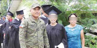 Alias “Kenken” (center), a former New People’s Army member turned aspiring fashion designer, joins the donning ceremony at Iloilo Science and Technology University–Miagao Campus on June 5. Now 24, she is set to graduate with a degree in Fashion and Apparel, marking a powerful journey from rebellion to reintegration. 61ST INFANTRY BATTALION PHOTO