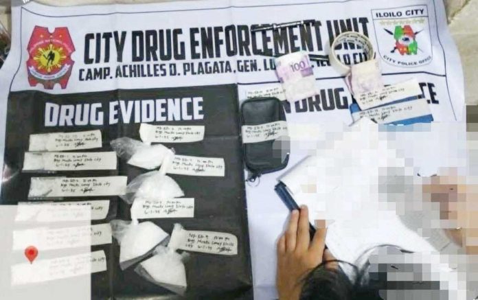 Officers of the Iloilo City Police Office’s City Drug Enforcement Unit recover P1.4 million worth of suspected shabu in a buy-bust operation in Barangay Muelle Loney, City Proper District on June 1, 2025. ICPO PHOTO